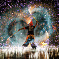 Fire show performer at night