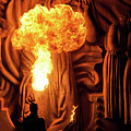 Fire spitter at night